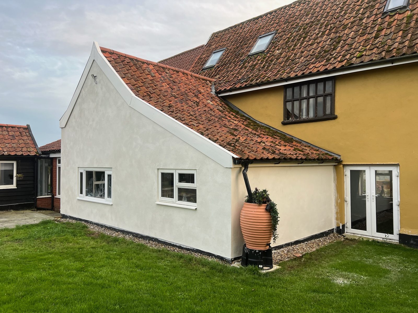 External render on a period property extension in Suffolk
