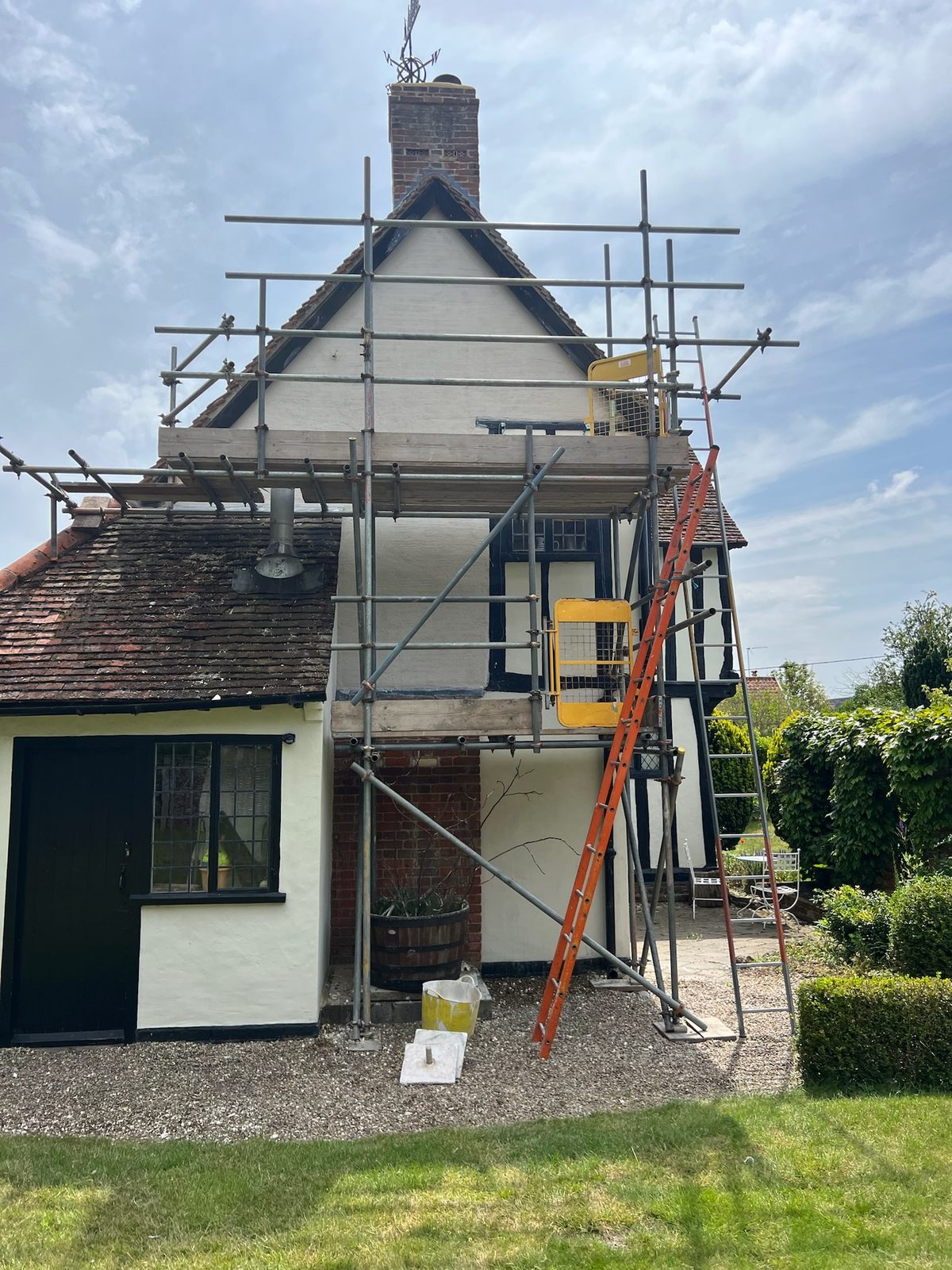 Lime render on a timber-framed period cottage in Suffolk